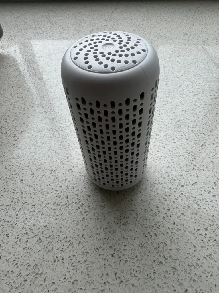 Cylindrical humidifier filter removed from the unit for inspection