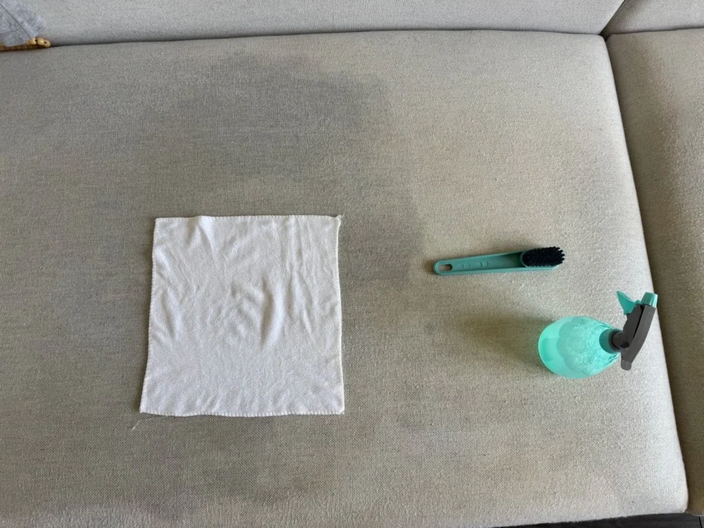 Cleaning supplies used for spot-cleaning a fabric surface