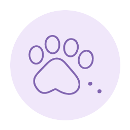 Cat paw print with a few scattered litter granules.